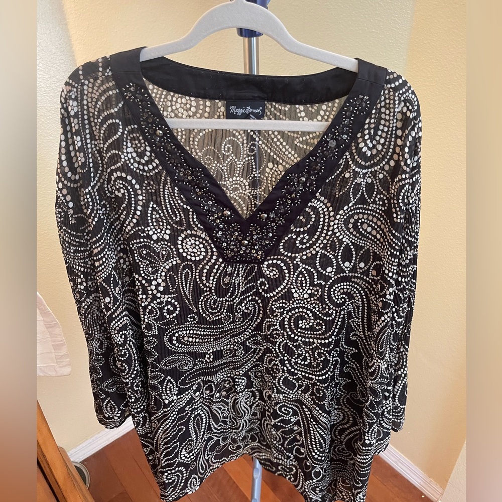 Maggie Barnes – black patterned blouse
